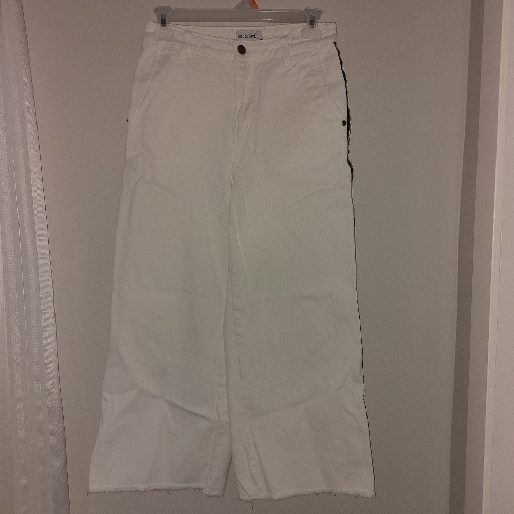 White Wide-Leg Pants With Black Stripes on the Outside of Each Leg